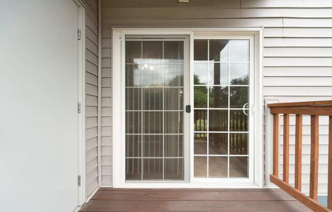 a screen door on a porch