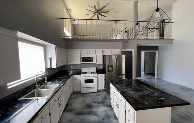 Custom 3 bedroom home with master bedroom downstairs!