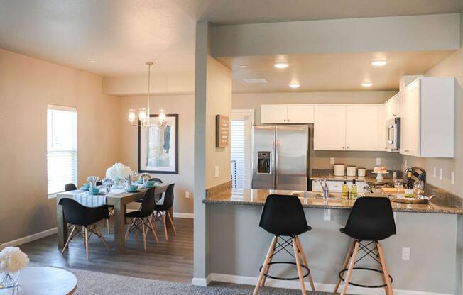 a living room filled with furniture and a table