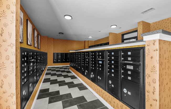 a locker room with a checkered floor and a bunch of lockers