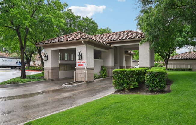 A house with a red roof and a sign that says