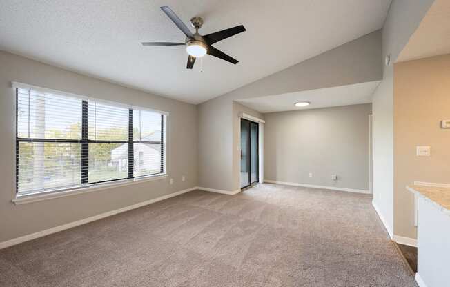 Model room with ceiling fan and carpet at Fountains at Lee Vista in Orlando, Florida.