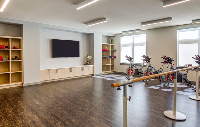 Fitness studio with barre, spin cycles and room to stretch