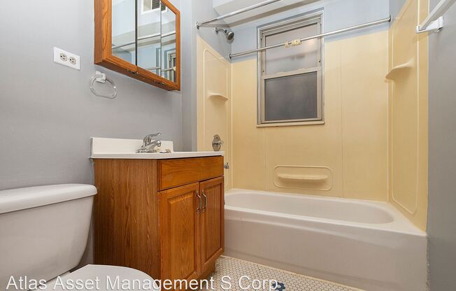 6001-05 S Whipple 3015-3021 W 60th St