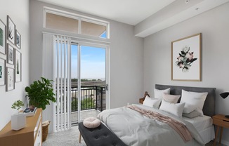 bedroom with large balcony window