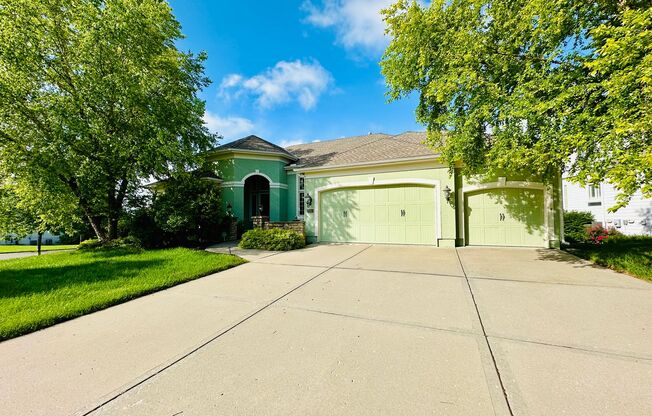 {9003} Wilshire Farms Reverse 1.5 Story Home + Walkout Basement + Three Car Garage + Fenced Yard