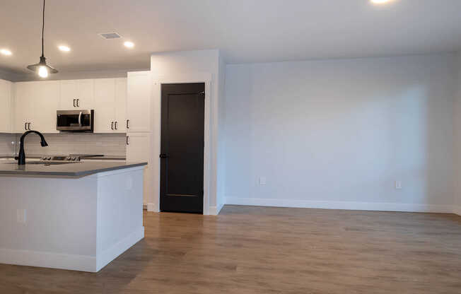 Living Area and Kitchen with Hard Surface Flooring