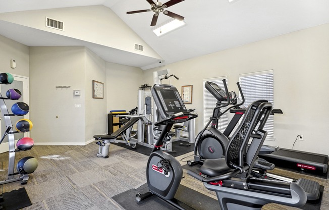 the gym with plenty of cardio equipment at the at the grove apartments at The Legends at Eagle Mountain Lake, Fort Worth, TX, 76179