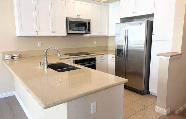 Stylish 3-Story Townhome with Balcony & Open-Concept Living