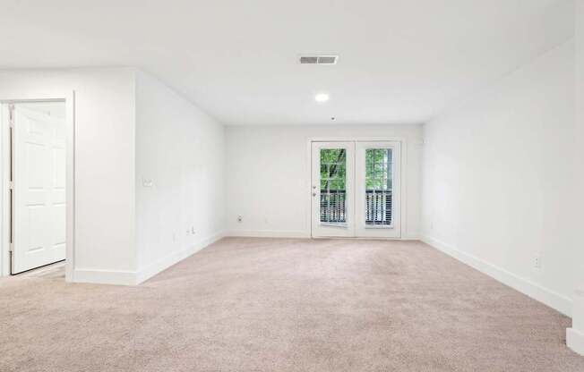 Living room with carpet and window
