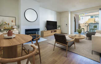 Living Room with Fireplace and Balcony