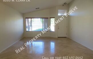 8205 W CLARA LN