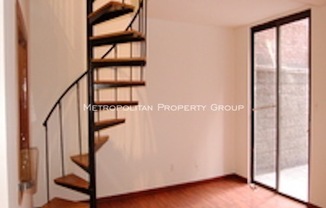 E 23rd St
