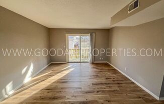 2 bedroom 1 full bath ground level condo with a detached garage