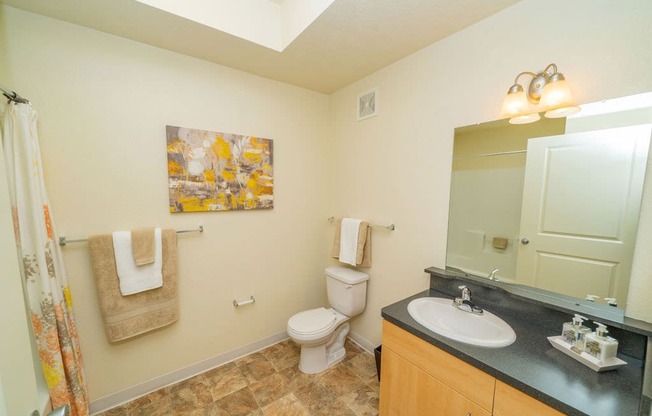 Bathroom With Extra Storage Space at Lynbrook Apartment Homes and Townhomes, Elkhorn, NE, 68022