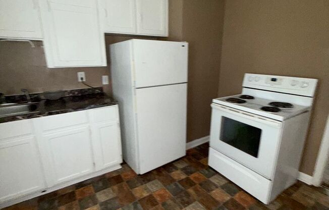 Charming 2-Bed End Unit in Quiet Quadplex- Move In Ready!