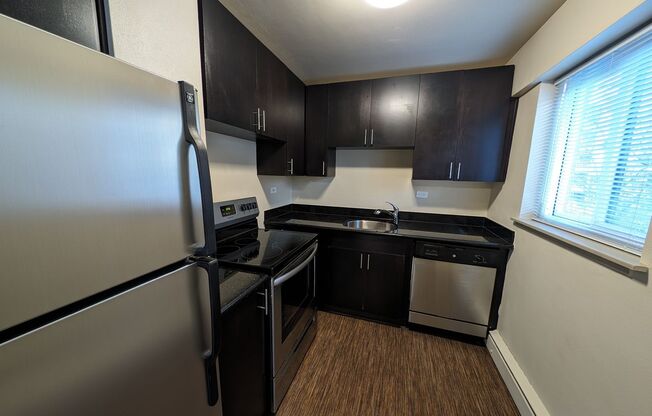 1 bed, 1 bath, 704 sqft, $1,925, Unit 202