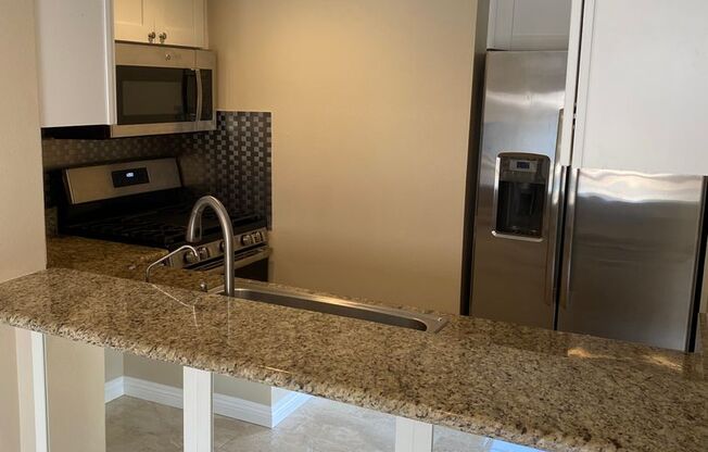 Remodeled upper 2 bed, 2 bath condo