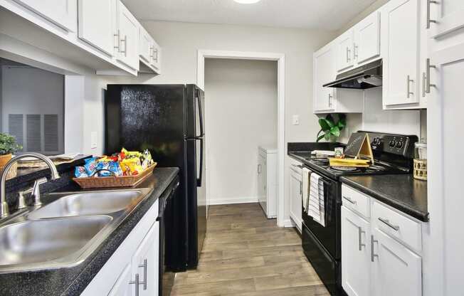 a kitchen 
at Sabal Point Apartments in Pineville, NC