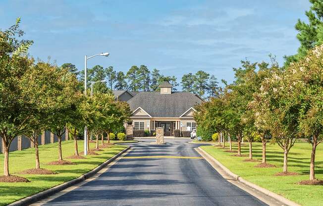 A long street with a house at the end.