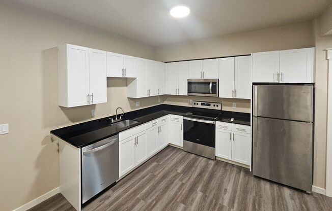 1 bed, 1 bath, 707 sqft, $1,595, Unit 303