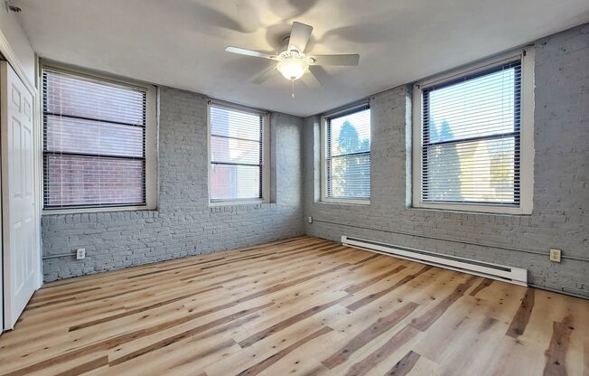 Loft style condo with 2bed 1.5bath, elevator building with parking.