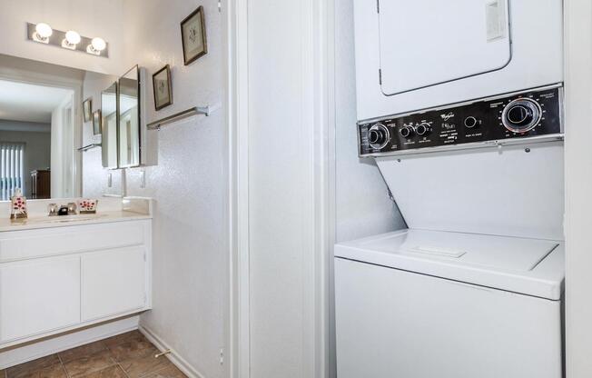 a white refrigerator freezer sitting inside of a kitchen