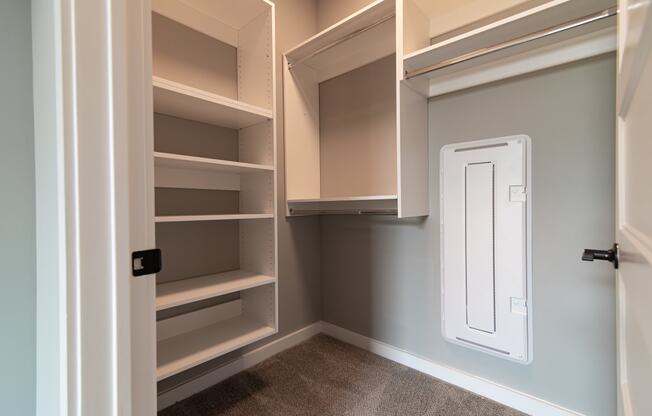 a walk in closet in a new home