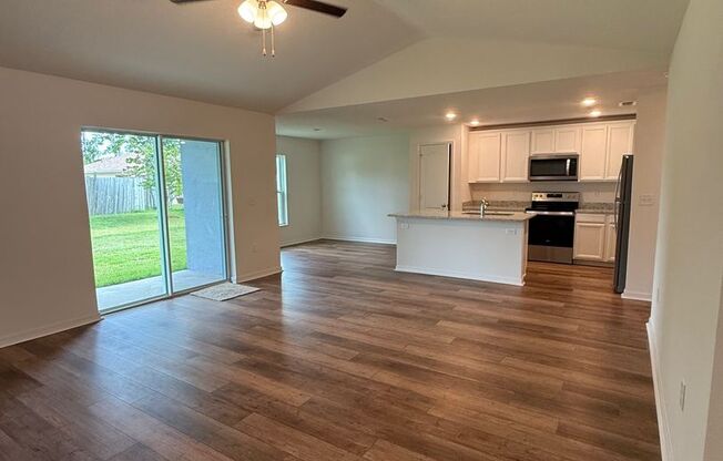 Stunning Brand-New 3 Bedroom + Den with Fenced in yard and screened in porch!