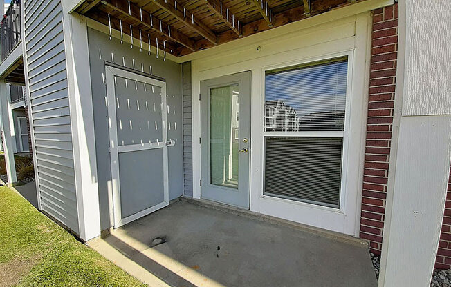 French Door to Private Patio at Hunters Pond Apartment Homes in Champaign, IL