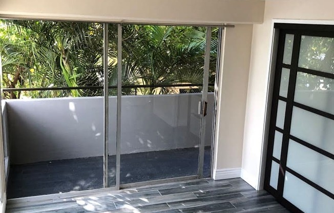 Napili Towers bedroom with closet and glass doors to the balcony