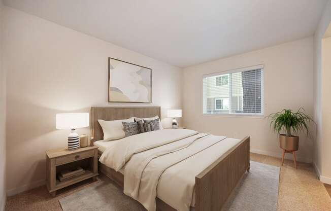 a bedroom with a large bed and a window at Rush River Apartments, Sacramento, CA