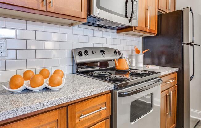 Electric Range In Kitchen at Greenway at Fisher Park, Greensboro, 27401