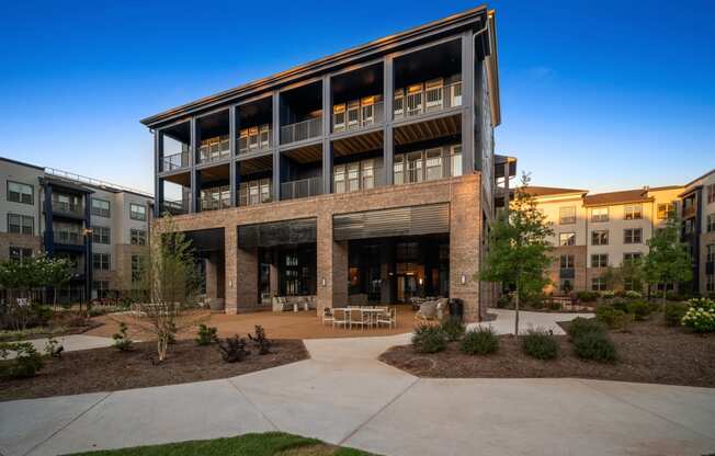 an office building with a courtyard in front of it at Preston Ridge, Cary, NC, 27513