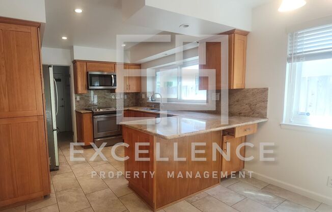 Spacious 4/2 with Workshop Area, Formal Dining Room, Living Room & Family Room, Yard & Pets Negotiable