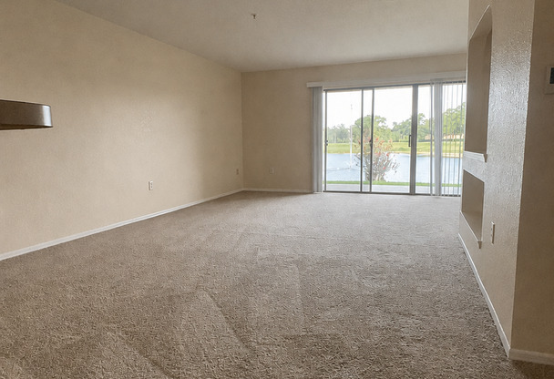 Stunning Water & Golf Course Views 2 Bedroom, 2 Bath First-Floor Condo