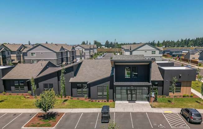 A row of houses with a car parked in front of them at Northplace Apartment Homes, Salem, OR, 97305