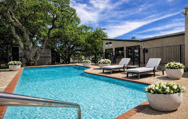 Unwind by the sparkling pool at The Riley Apartments, where relaxation meets sophistication. Enjoy stylish lounge areas and stunning views in a vibrant community. Elevate your lifestyle today – schedule your tour and see it for yourself!