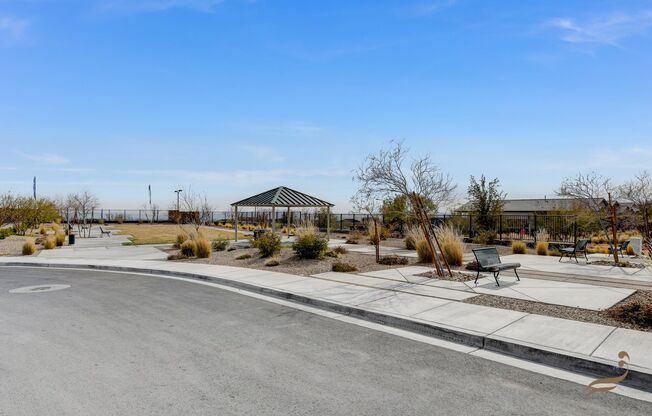 STUNNING SINGLE STORY 4 BEDROOM 2.5 BATHROOMS 3 CAR GARAGE IN GATED SUMMERLIN COMMUNITY WITH A STRIP VIEW!!