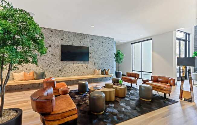 Living room filled with furniture and a flat screen tv at Array La Mesa, La Mesa, CA