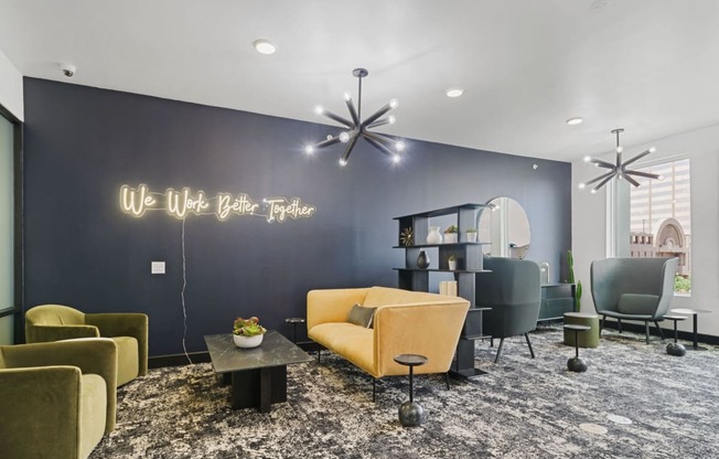 a lobby with couches and chairs and a coffee table