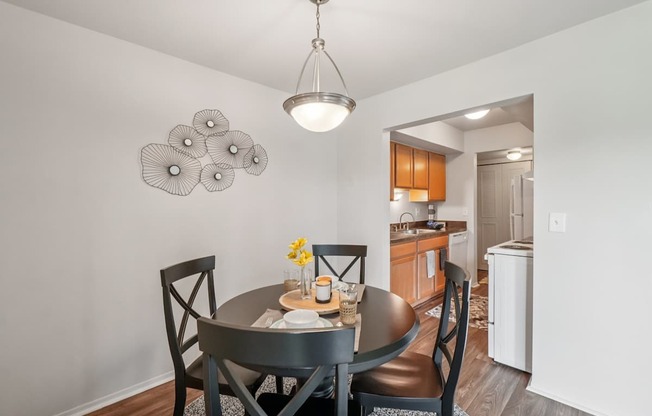 Spacious dining room area at Drawbridge Apartments in Harrison Township, MI.