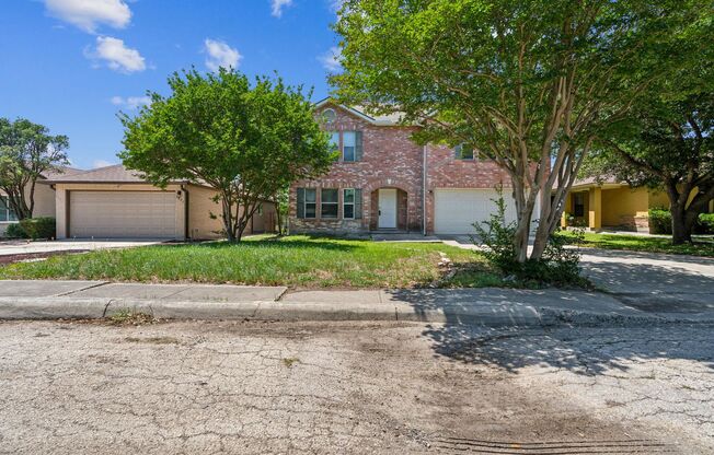 Spacious 4-Bedroom Home with Open Floor Plan & Brick Fireplace
