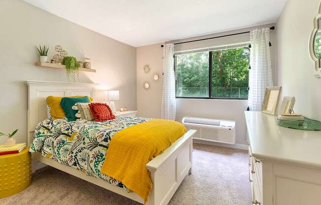 Expansive bedroom offering flexible furniture space and large closets.