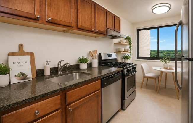 A kitchen with wooden cabinets and a black countertop.