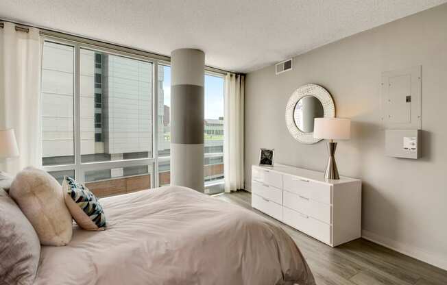 Spacious bedroom with city views at The Zenith, Baltimore
