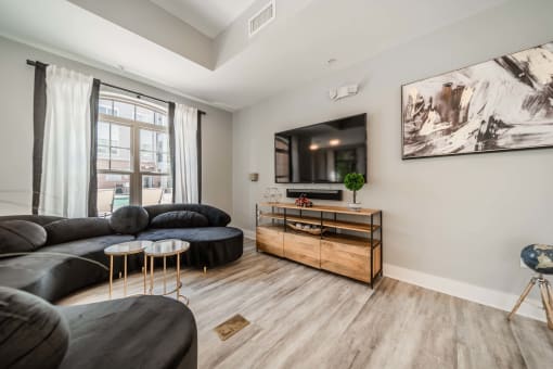 a living room with a couch and a tv