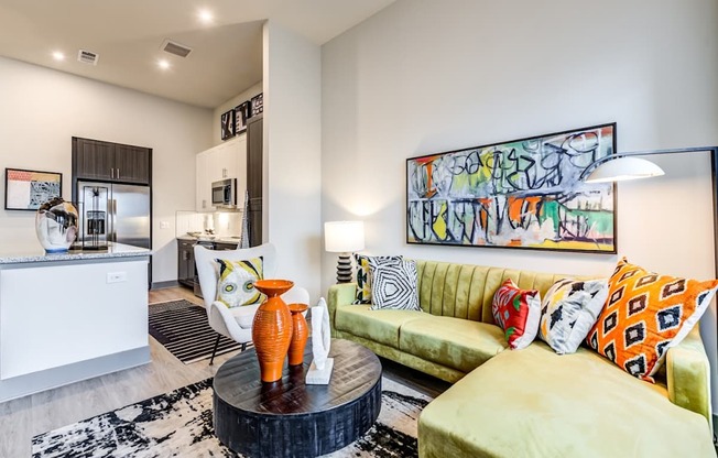 Living Area With Kitchen View at The Bridge at McKinney, McKinney, TX 75069