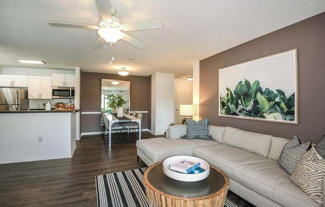 Living Room With Kitchen at Champions Walk Apartment Homes, Bradenton, FL
