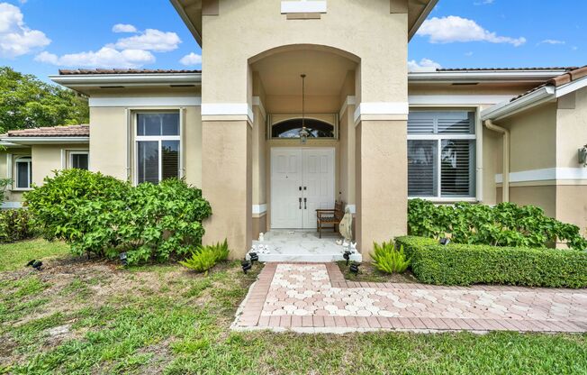 Elegant 4-Bedroom Pool Home in Exclusive Gated Community